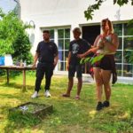Teamleiter:innen stehen im Schatten